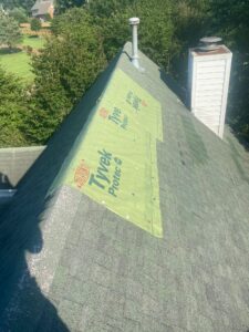 tarp on storm damaged roof
