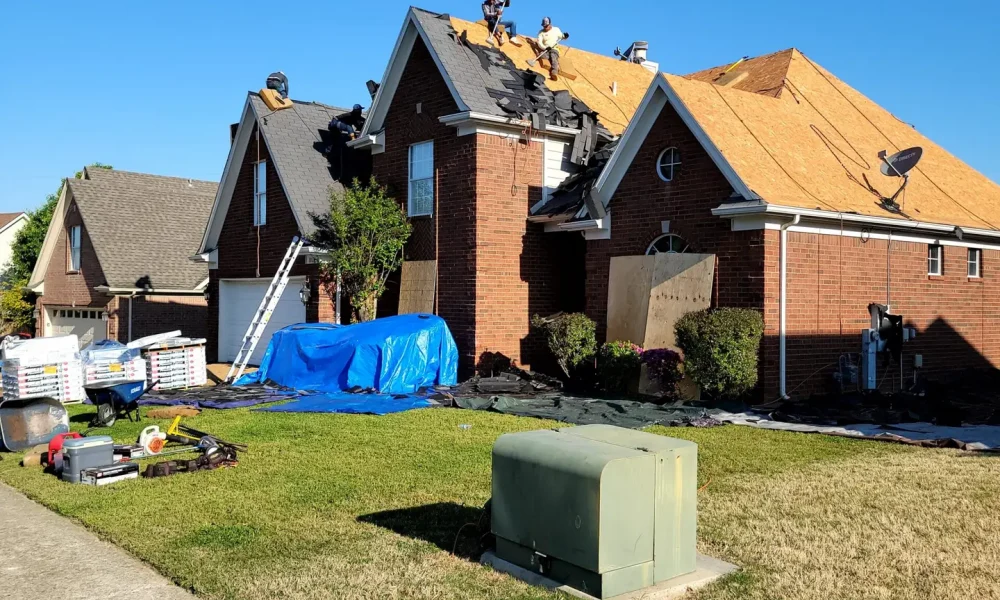 tearing off roof during roof replacement